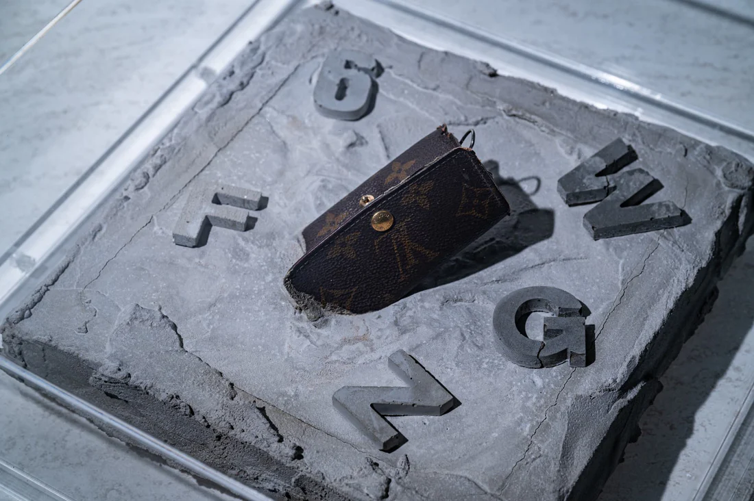 A leather artifact sealed into concrete